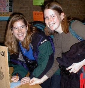 [Cardboard voting booth]