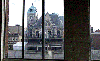 [Mansard roof, limestone tower]