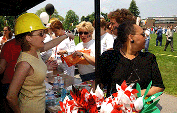 [Hard hat, water bottles, flags, pinwheels]