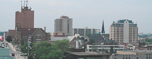 [Square towers and a church spire]