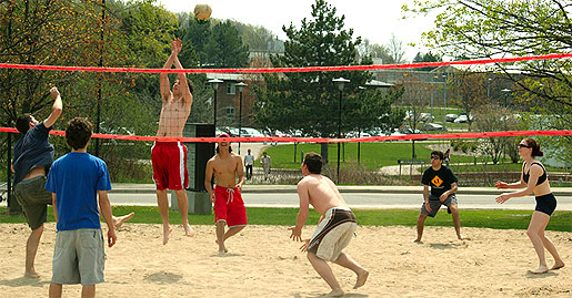 [Ring road and St. Jerome's behind volleyballers]