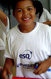 [Child in ESQ T-shirt]