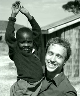 [Kielburger with African child]