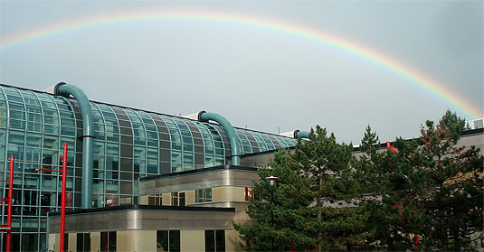 [Over the Davis Centre, against a variegated sky]