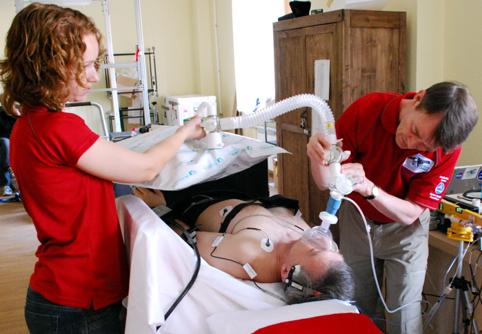 Richard Hughson of UW Kinesiology prepares astronaut Robert Thirsk for space launch May 27 2009.