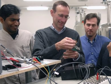 Ray Laflamme with research team