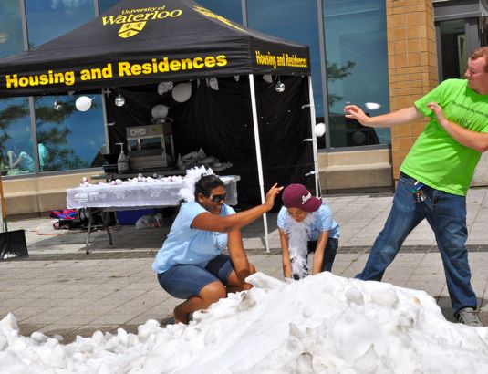 Snowball fight in SLC courtyard.