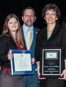 Margo Hilbrecht accepts the award on being of the Canadian Index of Wellbeing.