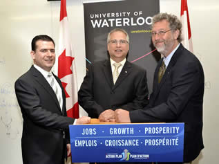 Michele Mosca and David Cory pose with Gary Goodyear.