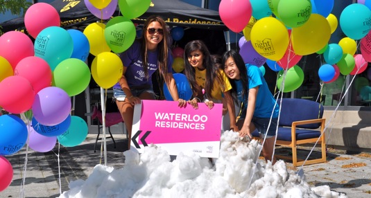 Residences Right Fit team members in pile of snow