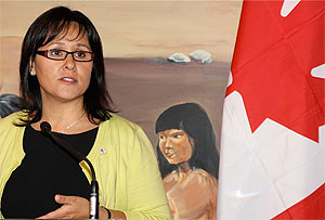 [Aglukkaq with flag]