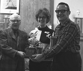 President Gerry Hagey and two trophy winners.