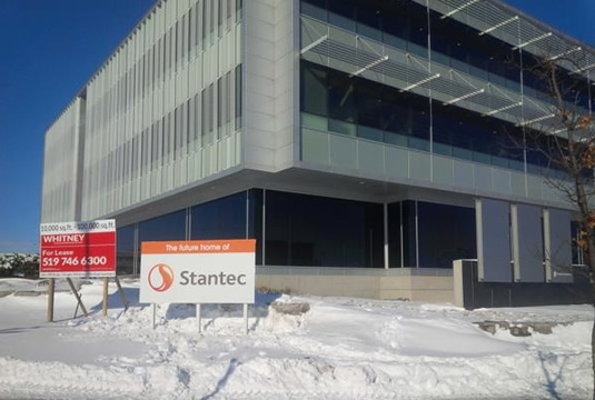 A "future home of Stantec" sign outside the InnoTECH building.