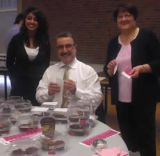 President Feridun Hamdullahpur assembles Treat-A-Grams last year.