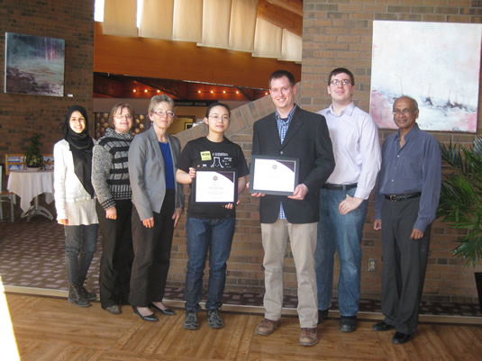 Teaching award winners and the selection committee at the University Club.