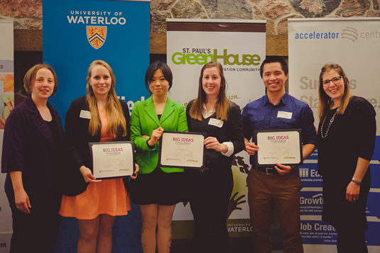 Winners of the pitch competition pose for a group photo.