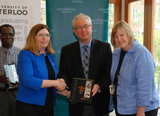 Dr. Ernest Osei of GRH’s medical physics department, GRH President and CEO Malcolm Maxwell, Peggy Jarvie, and Ann Lillepold GRH’s VP of Human Resources.