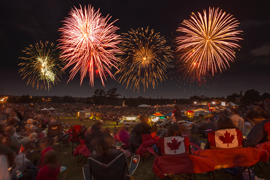 Fireworks exploding over Columbia Lake.