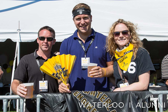 Waterloo alumni in the Alumni Tent at the Warrior football game.