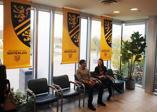 Banners on display in the Tatham Centre's windows.