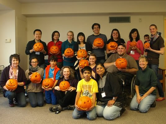 International Spouses group with their Jack O'Lanterns.