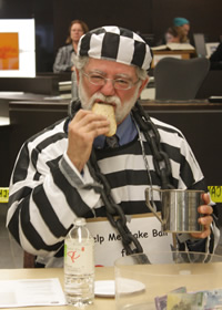 Mark Haslett enjoys bread and water as he sits in his jail cell.