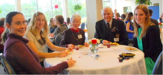 George and Louise Schroeder with guests.