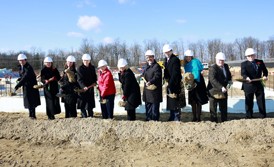 Dignitaries break ground in a ceremony Wednesday.