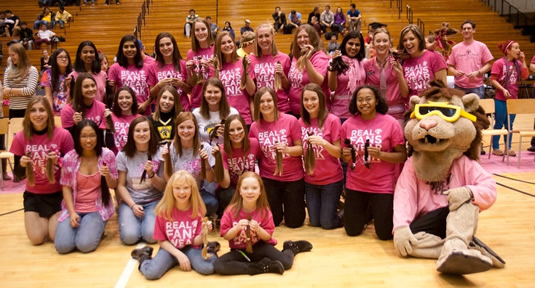 Student athletes, sports fans, and staff cut their hair for charity.