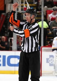 T.J. Luxmore calls his first penalty as an NHL ref.