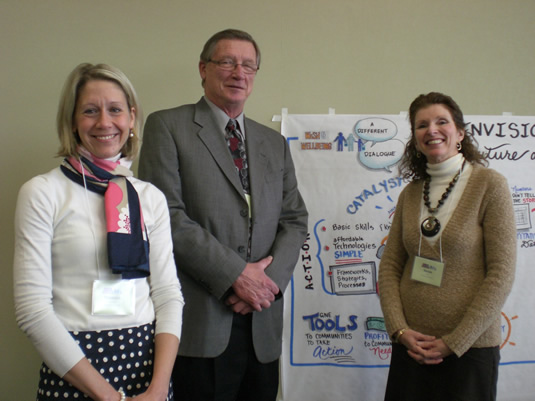 School of Public Health and Health Systems Assistant Professor Shannon Majowicz (left) stands with Robert Gillham, Executive Director of the Water Institute, and Susan Elliott, Dean of Applied Health Sciences.