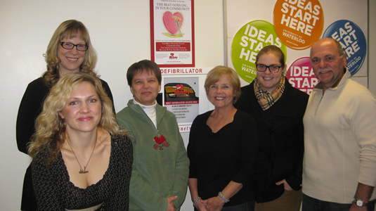 Julie Pocock, Erin Smith, Dorothy Chapman, Ileen, Samantha and Joe Capone pose with the defibrillator.