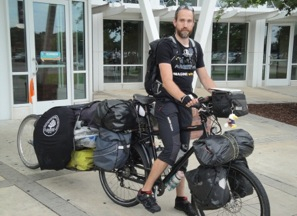 Max Peer on his bike and trailer.