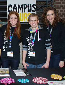 Volunteers prepare to conduct campus tours at the Open House event.